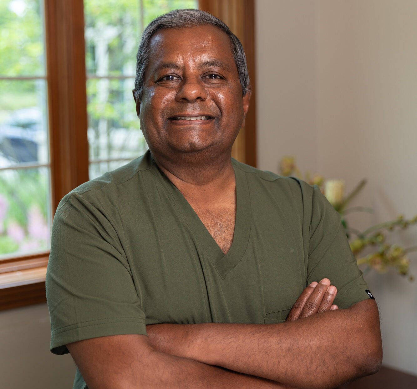 A headshot of Dr. Elluru, the best plastic surgeon in Kalamazoo