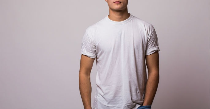 a photo of a man wearing a white t-shirt