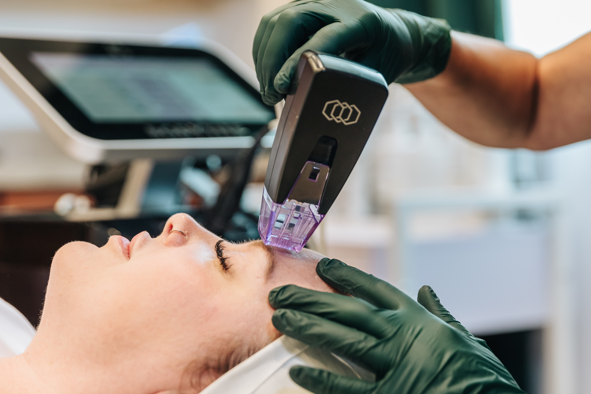 A patient lies back as a provider administers Morpheus in Kalamazoo County